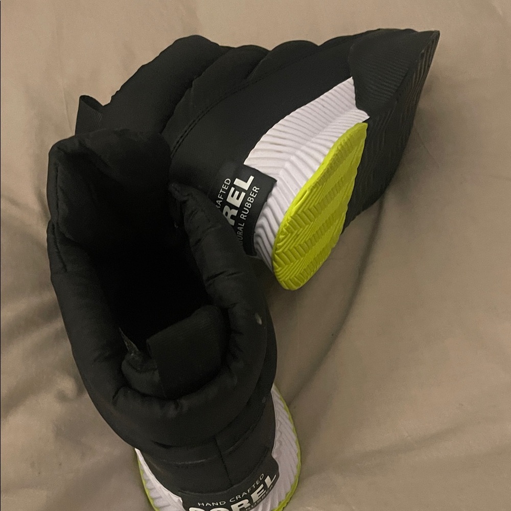 Sorel Women’s Out and About Puffy Zip Boot in black with white and neon - Picture 3 of 4